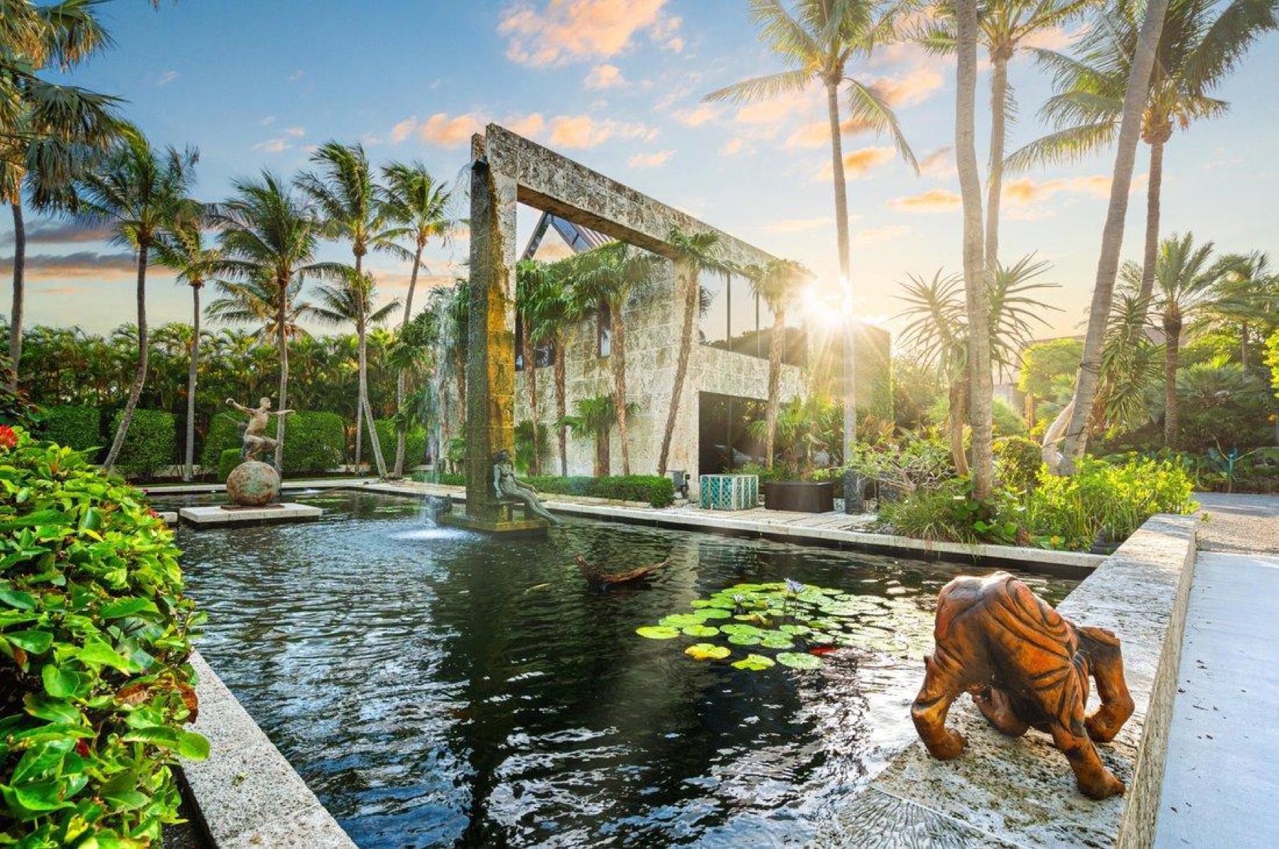 Long water court under palms